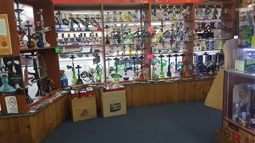TOBACCO ZONE VAPES GLASS CBD HOOKAHS KRATOM SMOKE SHOP